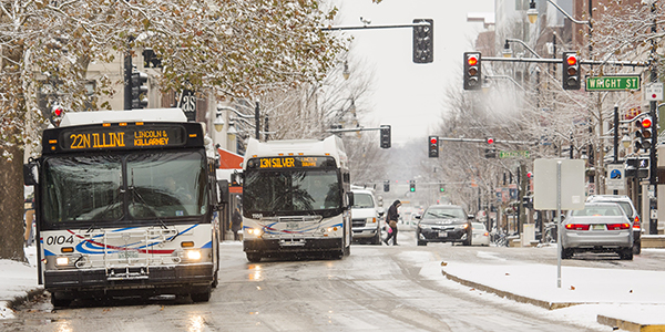 Buses and cars on Green Street in winter